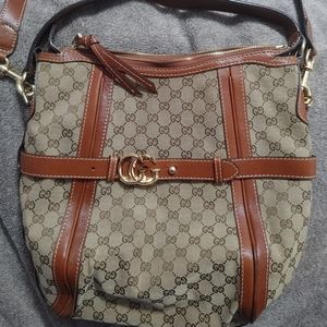 Gucci canvas and leather running hobo bag